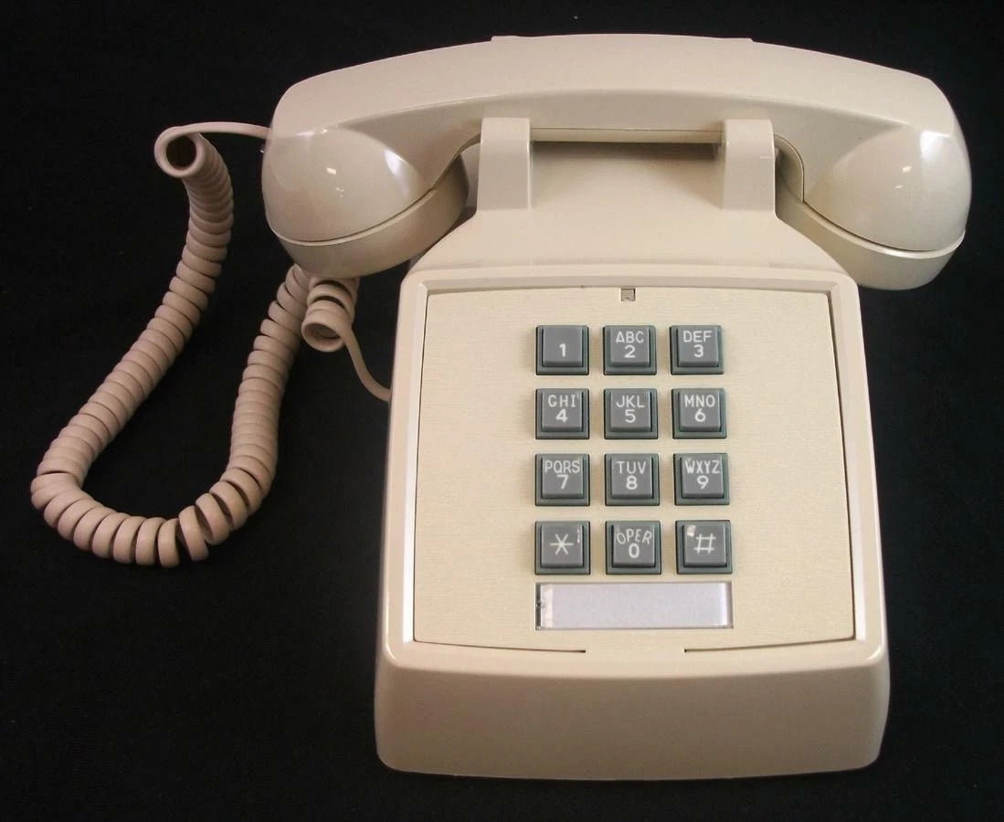Cortelco 2500-V-IV Desk Phone with Volume Control - Ivory