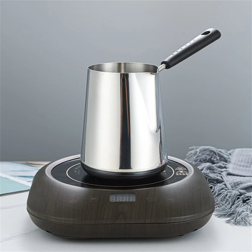 Milk Heating Pan for Cooking Experience (No Year Range Provided)
